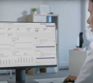 Nurse viewing Caspar AI dashboard on computer