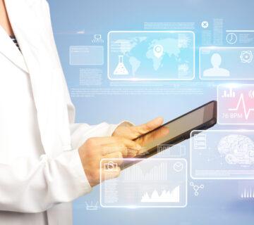 Female doctor with tablet and health data